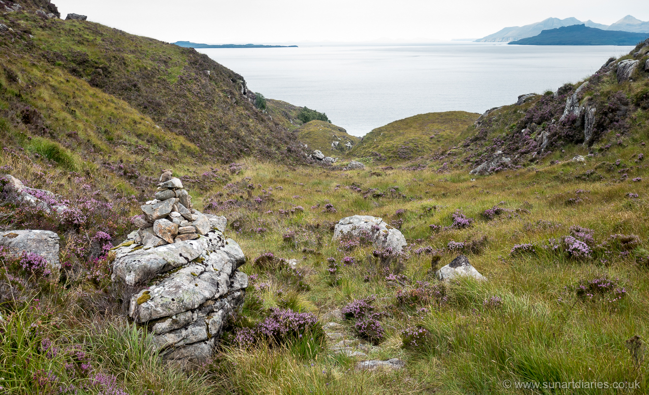 Looking back … an irritating cairn spoiling the view of the Sound of Eigg, with Rum in the background